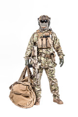 Obraz premium Soldier standing with duffel bag studio shot