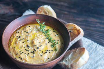Bowl of pumpkin hummus