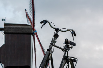 Bicycle in front of Bruges mill (Belgium/Netherland concept)