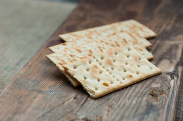 several cookies cracker on a simple wooden background