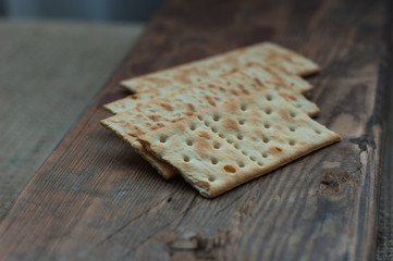 several cookies cracker on a simple wooden background