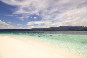 Fototapeta na wymiar beautiful seascape from an atoll in raja ampat archipelago
