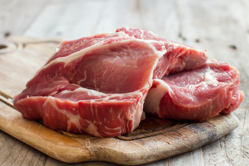 Raw pork steaks