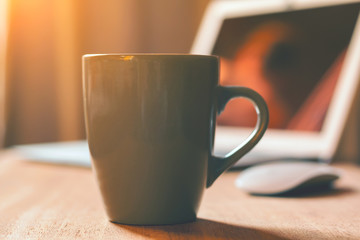 Grey mug on the desktop