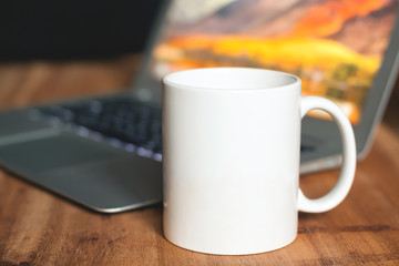 White mug on the desktop - 179752368