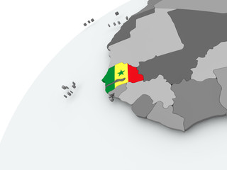 Fototapeta premium Flag of Senegal on grey globe