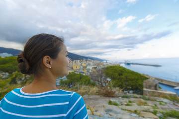 A woman is travelling on the Corsica island