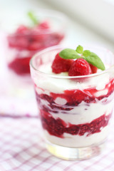 Dessert with raspberries and cream