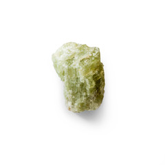 Green spodumene crystals isolated on white background