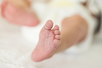 Fuß eines neugebohrenen Säuglings