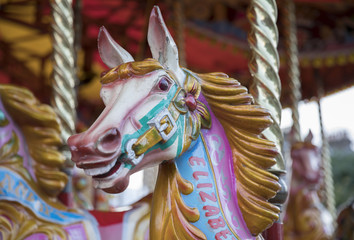 Closeup of colorful old fashioned fairground horse 
