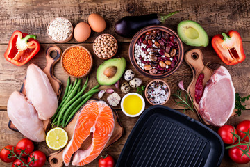 Healthy food cooking. Meat, fish, vegetables,pan for cooking grill. Healthy eating concept. Top view