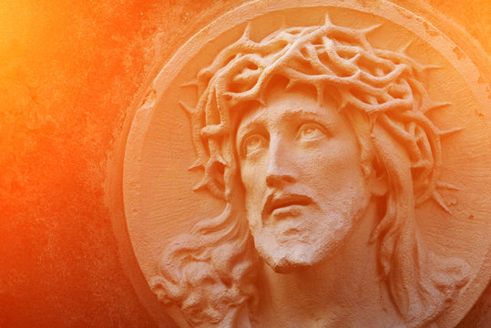 The face of Jesus Christ in a crown of thorns as a symbol of suffering and salvation of mankind. (healing, spiritual development, religious events - the concept)