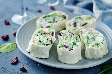 Turkey spinach ricotta dried cranberry roll ups