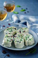 Turkey spinach ricotta dried cranberry roll ups