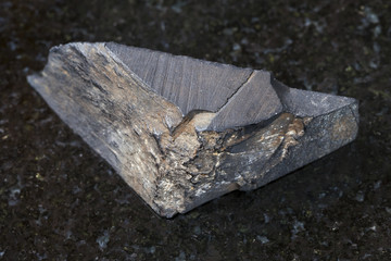 raw Gagate (Jet) stone on dark background