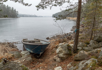 Boat at frozen lake