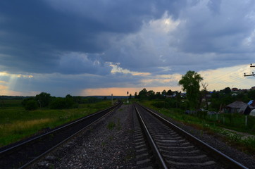 Fototapeta na wymiar Rails under the evening sky.