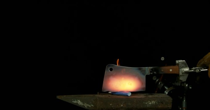Flames Rise Around a Meat Cleaver