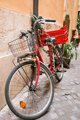 Fototapeta na wymiar Red bike, orange wall