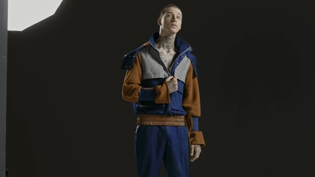 Handsome stylish fashion model - neck tattoo - male fashion model - Fashion shot