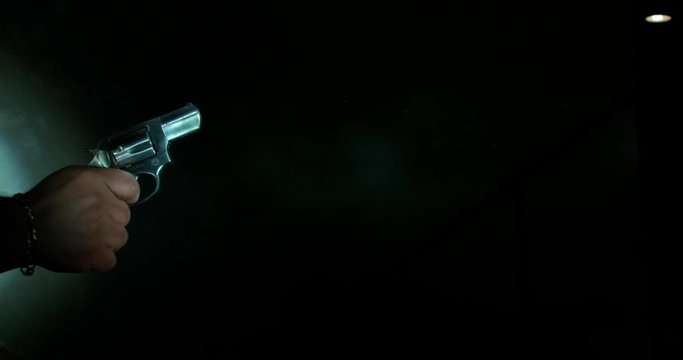 Revolver Fires, Medium Shot
