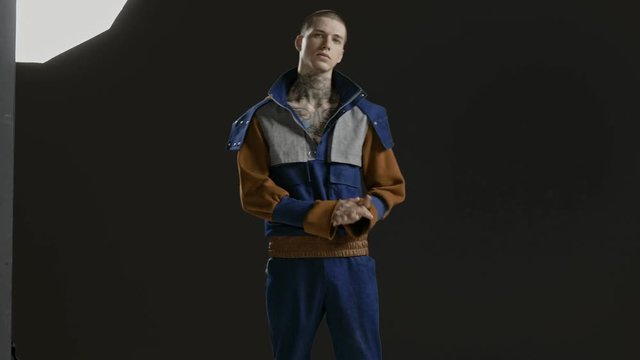 Handsome stylish fashion model - neck tattoo - male fashion model - Fashion shot