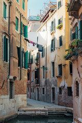 Fototapeta na wymiar Narrow street in the old town in Venice