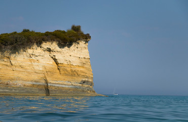  unspoiled turquoise paradise beach with beautiful rocks on sunny scorching day