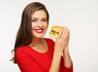 Woman eating burger. Isolated portrait on white
