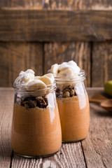 Pumpkin smoothie with granola and bananas