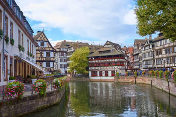 Fototapeta na wymiar Beautiful downtown of Strasbourg / Housing and river in city of Strasbourg in Alsace France