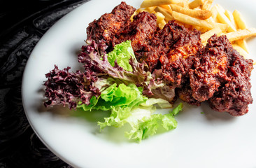 meat and fried and potatoes