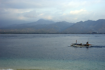 Beach on Gili islands, Bali : Colored wooden boats