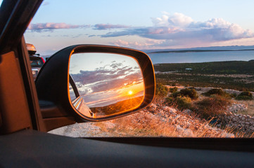 Sunset in the car mirror
