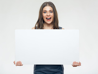 Fototapeta premium Businesswoman holding big white banner.