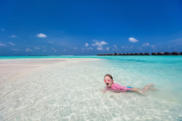 Fototapeta na wymiar Child on a tropical vacation