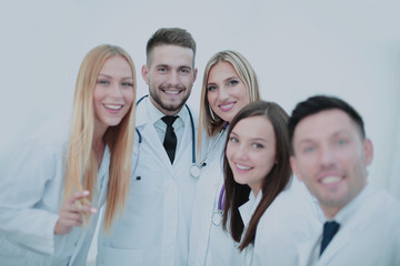Obraz premium Happy doctors are making selfie using a smartphone and smiling.