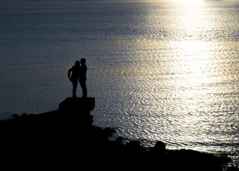 Couple at Shore of River