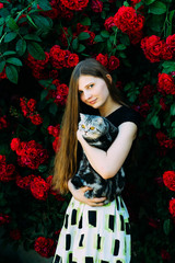 Young is a beautiful girl with a British cat