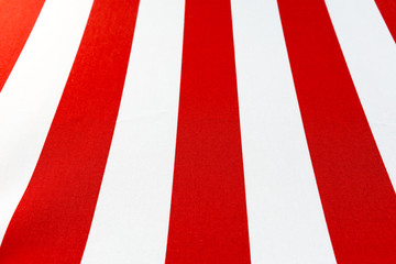 Fototapeta na wymiar Red and White striped canvas from lower angle
