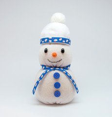 Photo of snowman isolated on neutral background