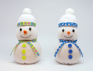 Photo of snowmans isolated on neutral background