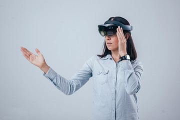 Woman wearing augmented reality goggles.