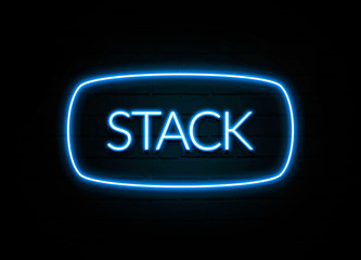 Stack  - colorful Neon Sign on brickwall