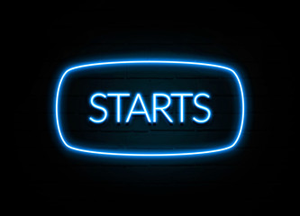 Starts  - colorful Neon Sign on brickwall