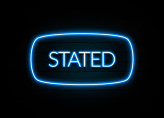 Stated  - colorful Neon Sign on brickwall