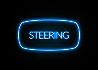 Steering  - colorful Neon Sign on brickwall