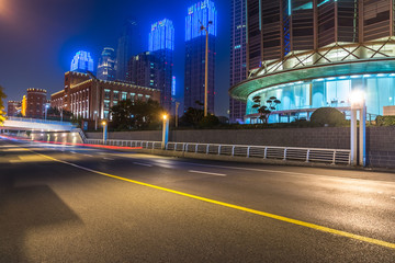 Naklejka na ściany i meble Empty urban road and modern skyline in china