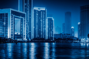 Fototapeta na wymiar Tianjin Hai river waterfront downtown skyline,blue toned image.